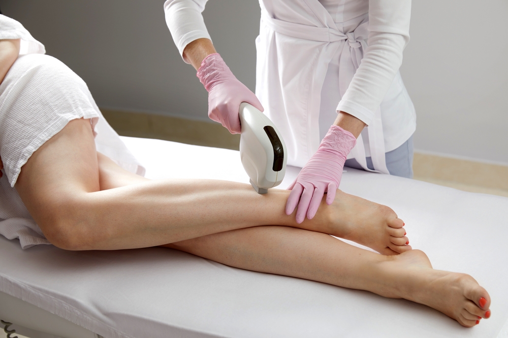 woman during one of her laser hair removal sessions in Capitol Hill
