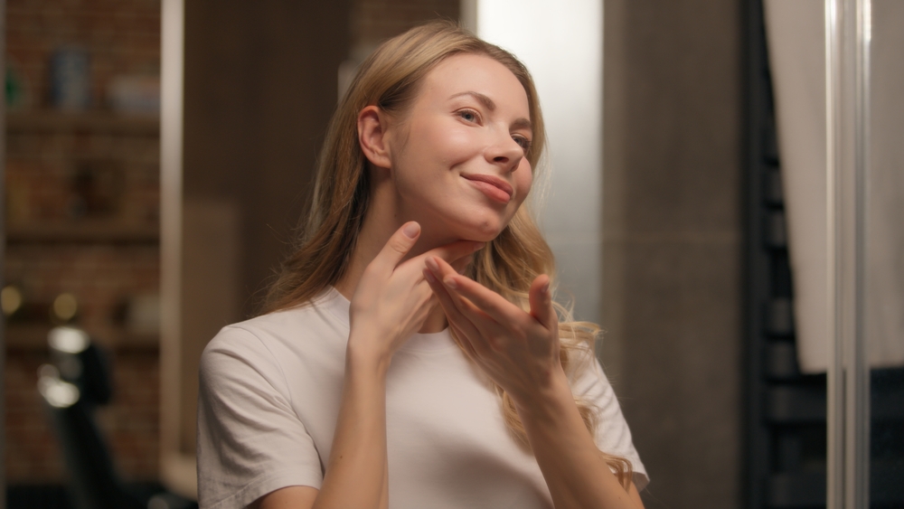 woman taking care of skin after laser treatments in DC