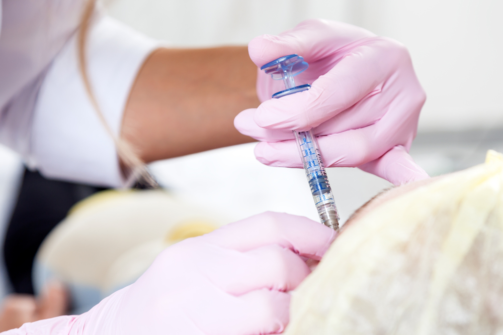 a provider injects Botox in Capitol Hill